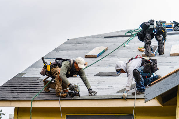 Professional Roofing technician working in Lunenburg, MA